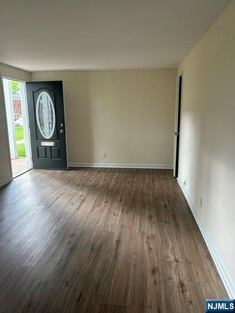 415 Ridge Road, Unit E North Arlington, NJ 07031 - Photo 2 of 6 a view of a room with wooden floor