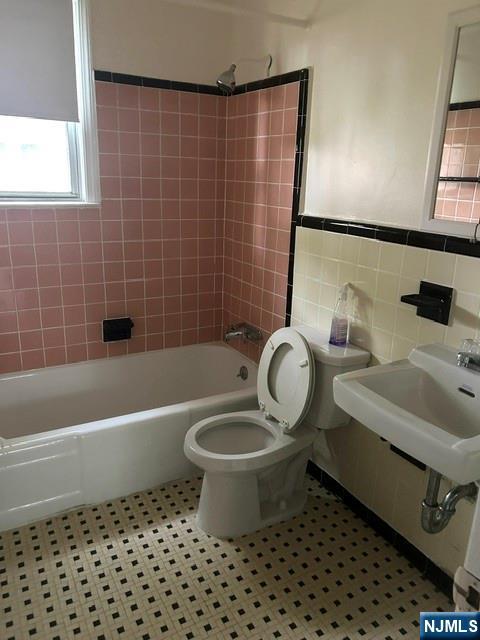415 Ridge Road, Unit E North Arlington, NJ 07031 - Photo 6 of 6 a bathroom with a sink toilet and shower