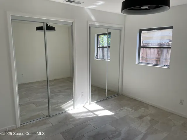 a view of a livingroom with a window