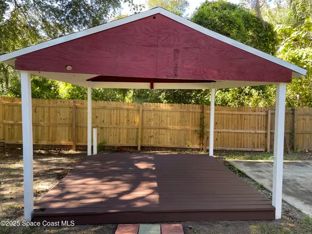 a view of a backyard with a garden
