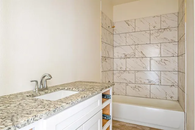 a view of walk in closet with window