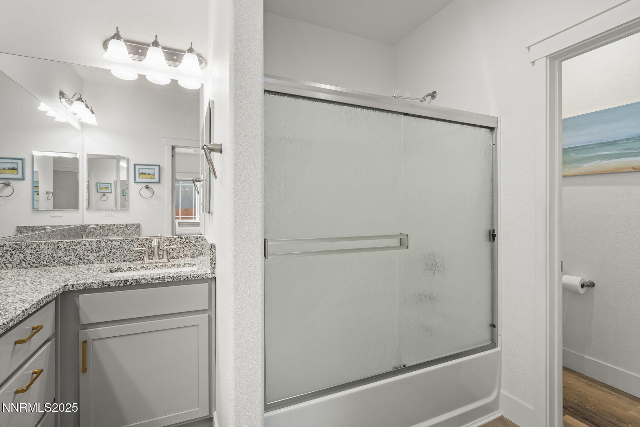 1075 West Slab Cliffs Reno, NV 89508 - Photo 16 of 22 a bathroom with a granite countertop shower sink vanity and mirror