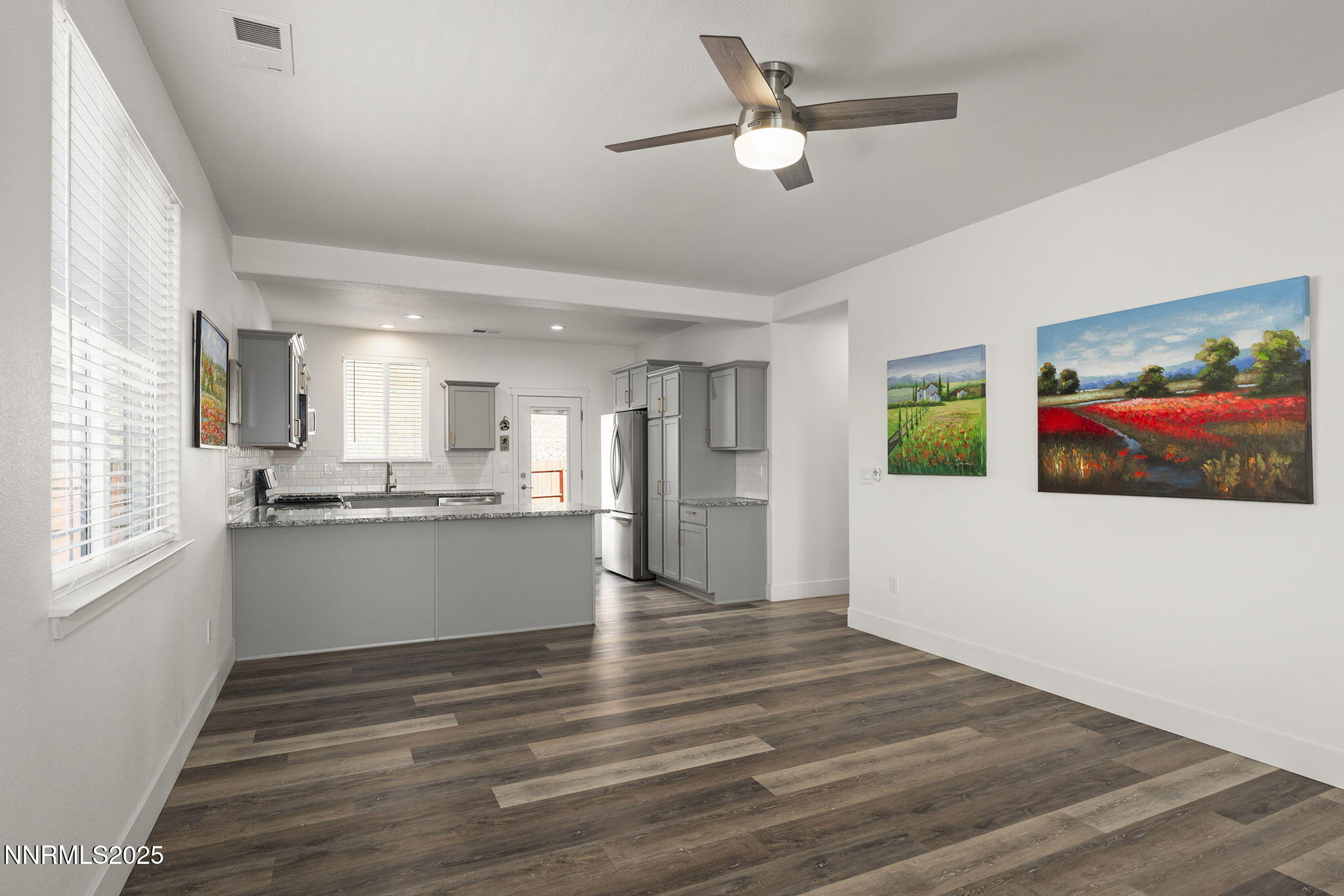 1075 West Slab Cliffs Reno, NV 89508 - Photo 7 of 22 a view of kitchen with wooden floor and window