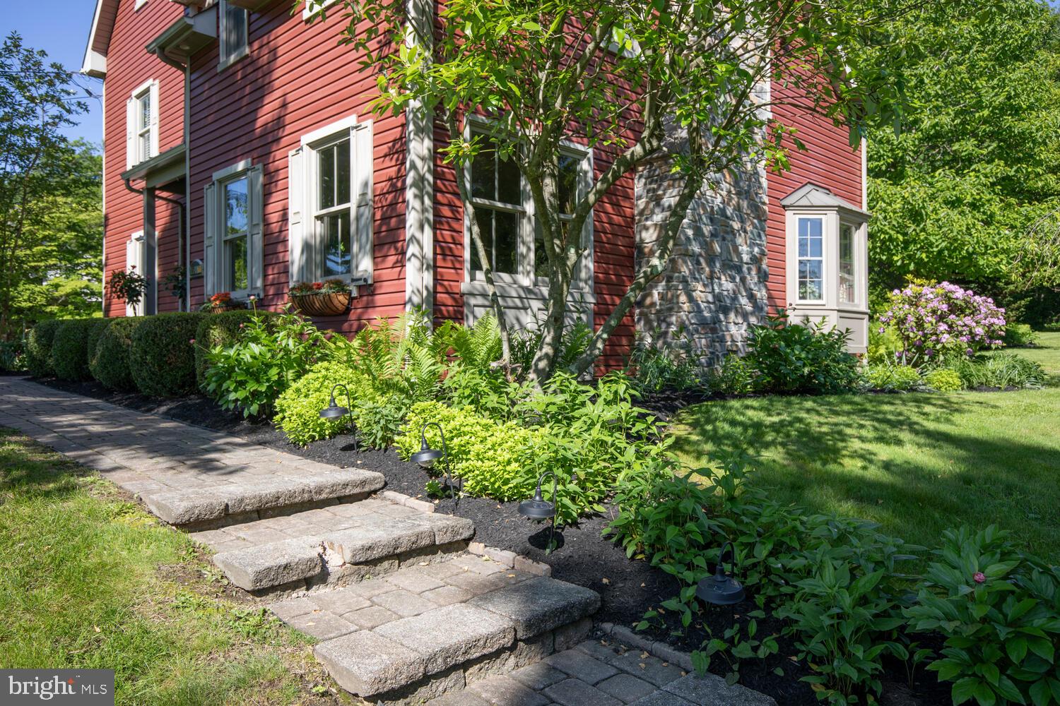 4367 Curly Hill Road Doylestown, PA 18902 - Photo 2 of 72 a front view of a multi story residential apartment building with yard and green space