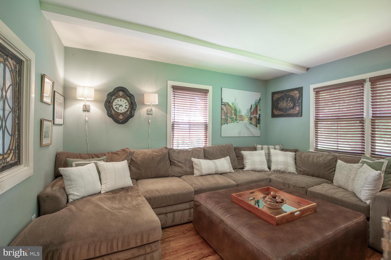 4367 Curly Hill Road Doylestown, PA 18902 - Photo 26 of 72 a living room with furniture and a large window