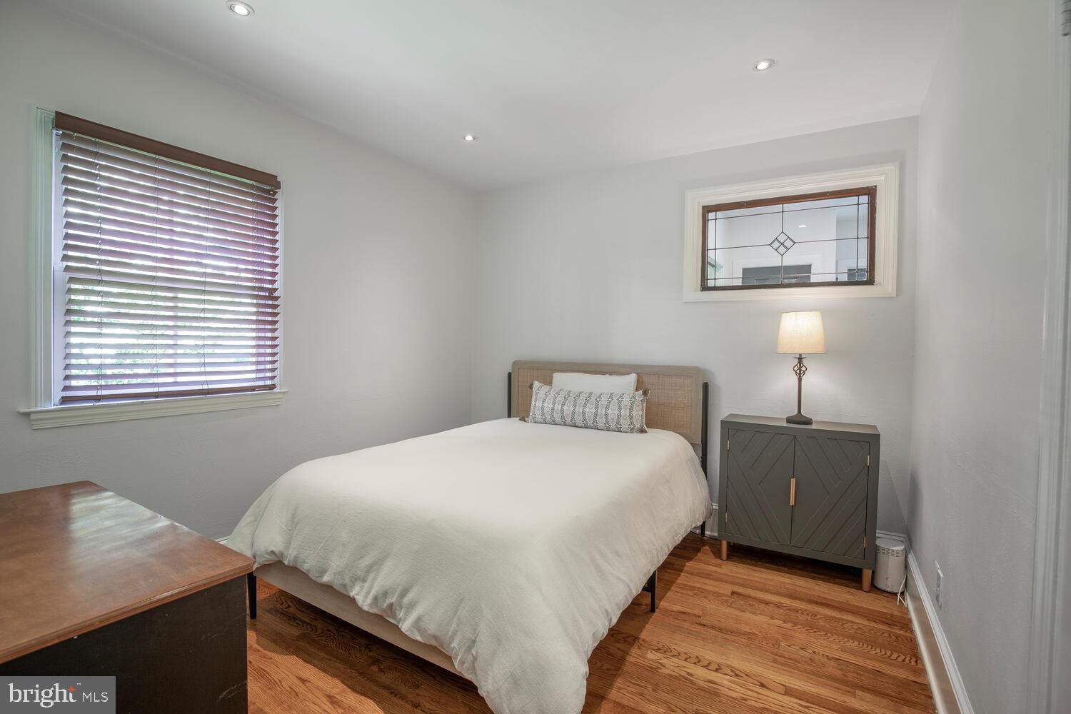 4367 Curly Hill Road Doylestown, PA 18902 - Photo 28 of 72 a bedroom with a bed and a window