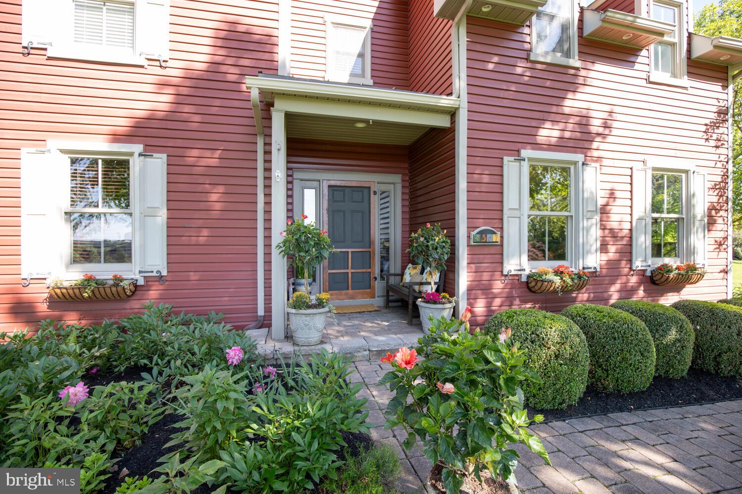 4367 Curly Hill Road Doylestown, PA 18902 - Photo 3 of 72 a view of a house with chairs and plants