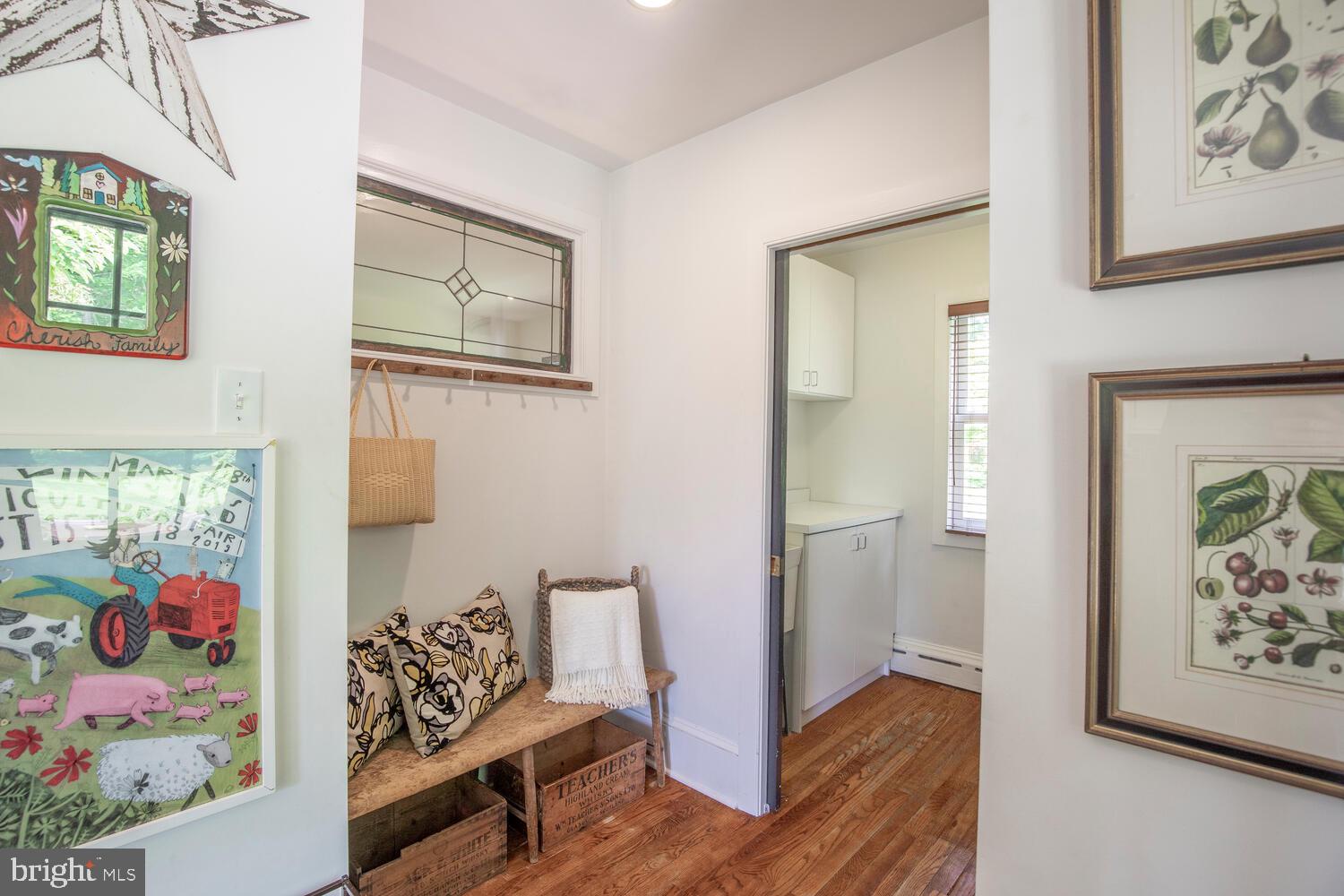 4367 Curly Hill Road Doylestown, PA 18902 - Photo 32 of 72 a living room with furniture and wooden floor