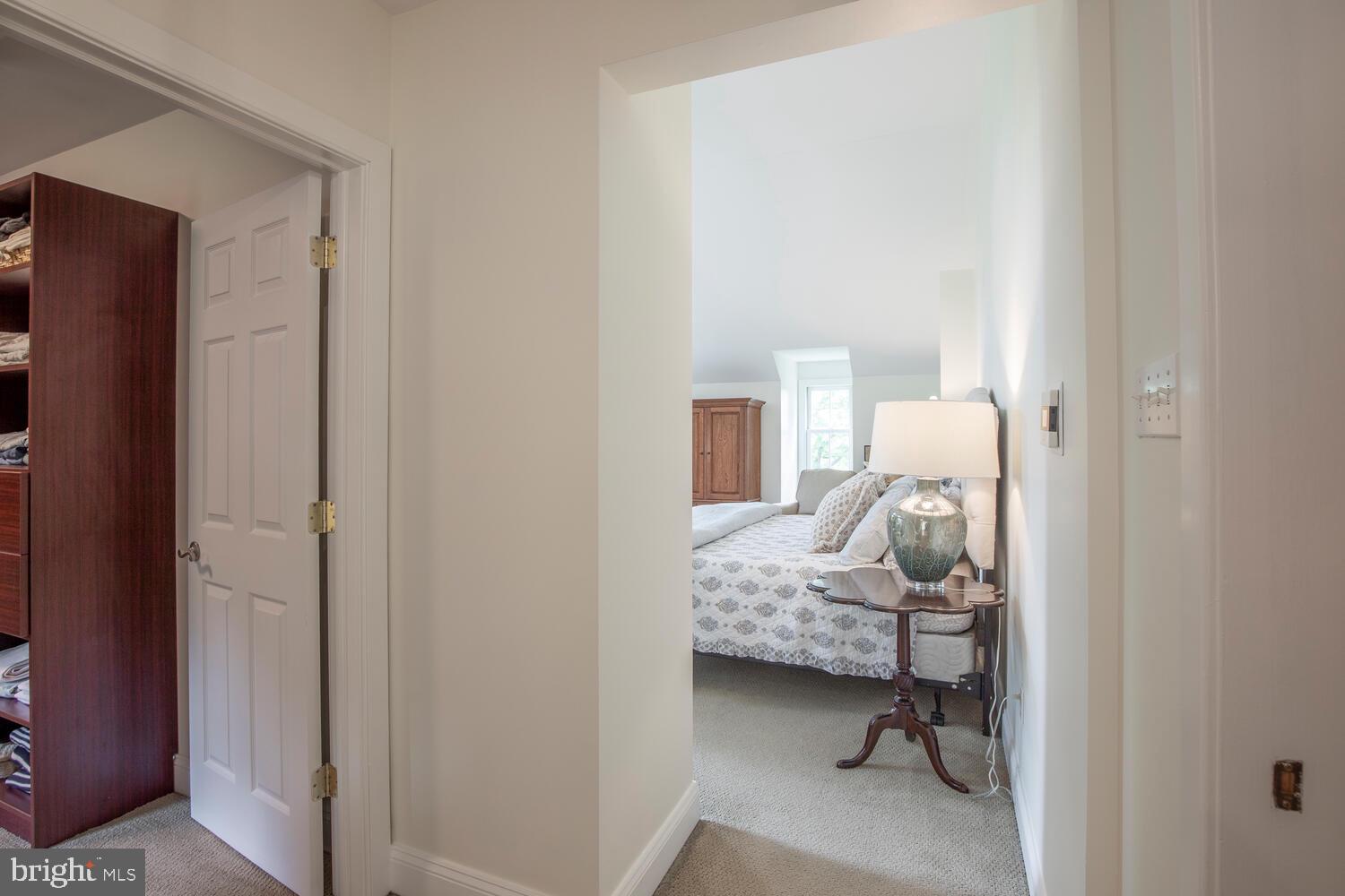 4367 Curly Hill Road Doylestown, PA 18902 - Photo 43 of 72 a bedroom with a bed and a chair