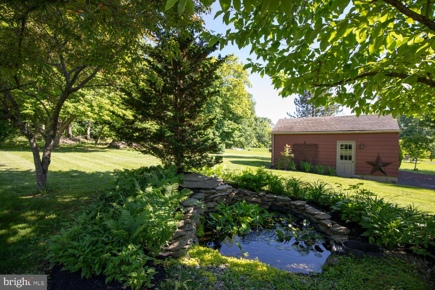 4367 Curly Hill Road Doylestown, PA 18902 - Photo 58 of 72 a front view of a house with garden