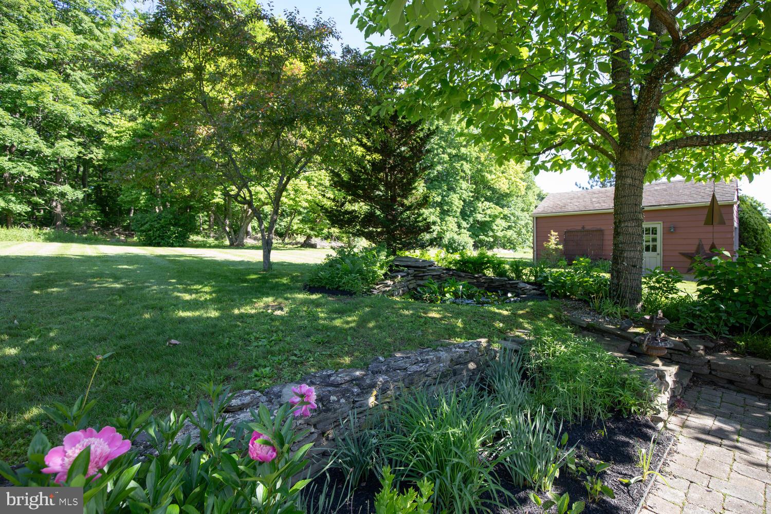4367 Curly Hill Road Doylestown, PA 18902 - Photo 60 of 72 a view of a flower in a yard