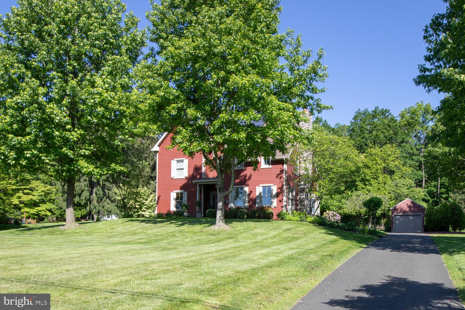 4367 Curly Hill Road Doylestown, PA 18902 - Photo 65 of 72 a front view of a house with a garden