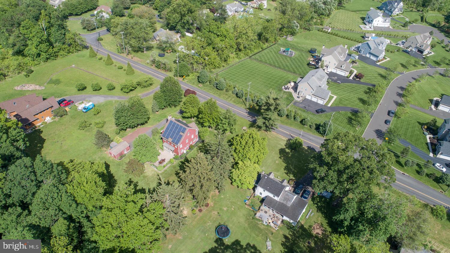 4367 Curly Hill Road Doylestown, PA 18902 - Photo 70 of 72 an aerial view of residential houses with outdoor space