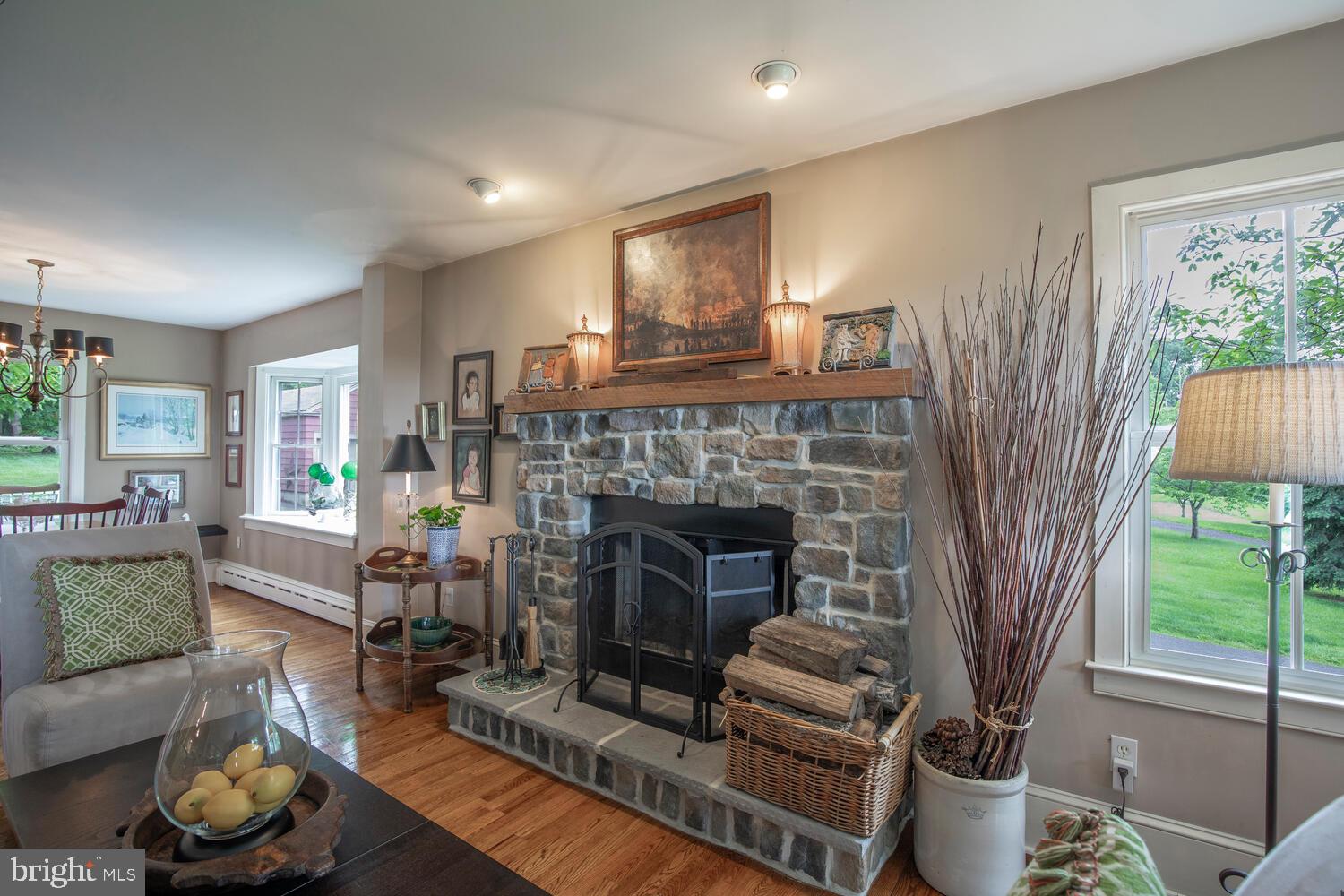 4367 Curly Hill Road Doylestown, PA 18902 - Photo 8 of 72 a living room with furniture and a fireplace