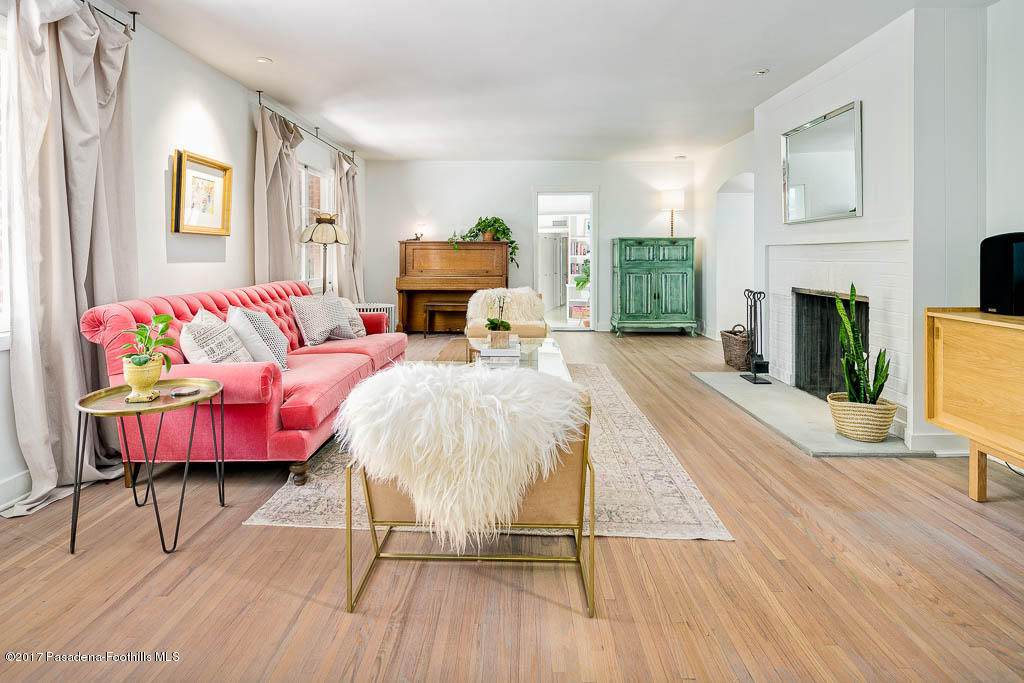 1336 Inverness Drive Pasadena, CA 91103 - Photo 12 of 42 a living room with furniture a fireplace and a potted plant