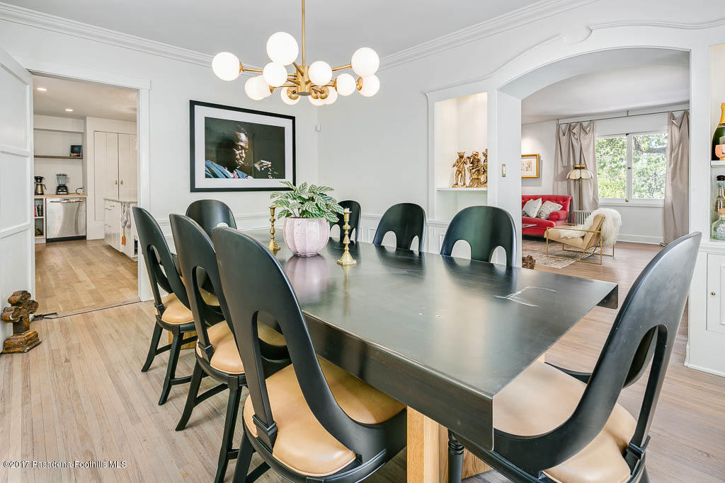 1336 Inverness Drive Pasadena, CA 91103 - Photo 16 of 42 a view of a dining room with furniture and a chandelier