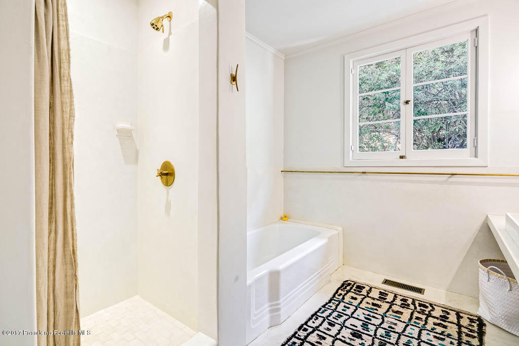 1336 Inverness Drive Pasadena, CA 91103 - Photo 24 of 42 a bathroom with a bathtub and shower