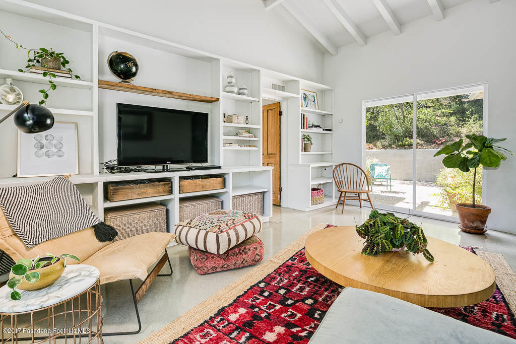 1336 Inverness Drive Pasadena, CA 91103 - Photo 26 of 42 a living room with furniture and a flat screen tv