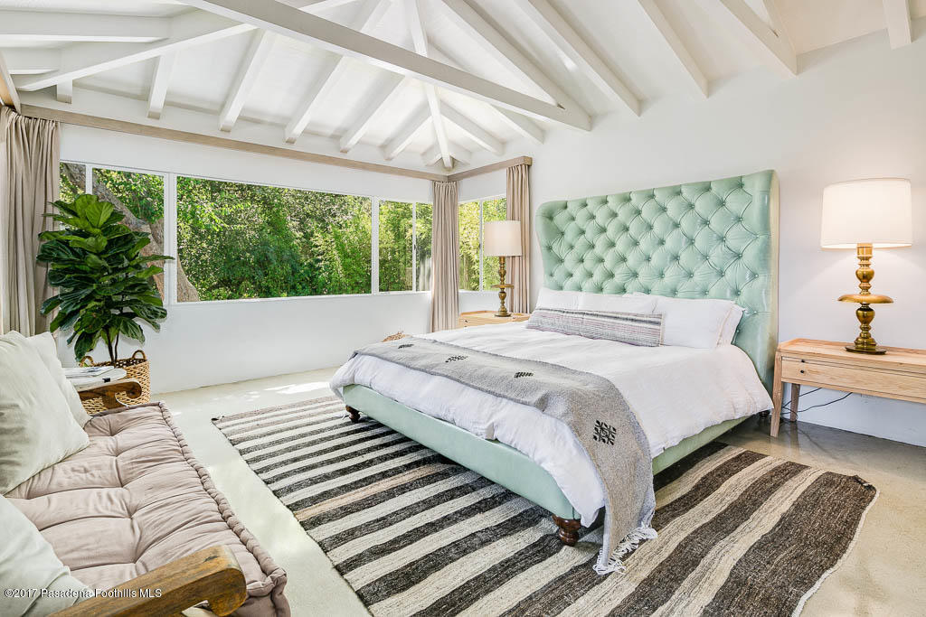 1336 Inverness Drive Pasadena, CA 91103 - Photo 27 of 42 a bed sitting in a bedroom next to a window