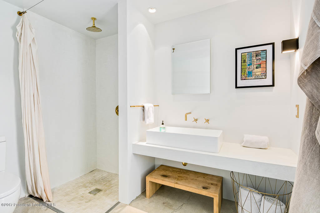 1336 Inverness Drive Pasadena, CA 91103 - Photo 31 of 42 a bathroom with a sink a toilet and shower