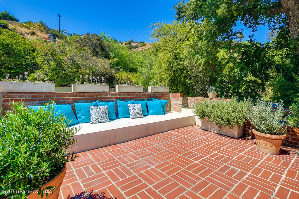 1336 Inverness Drive Pasadena, CA 91103 - Photo 10 of 42 a view of a chairs and table on the terrace