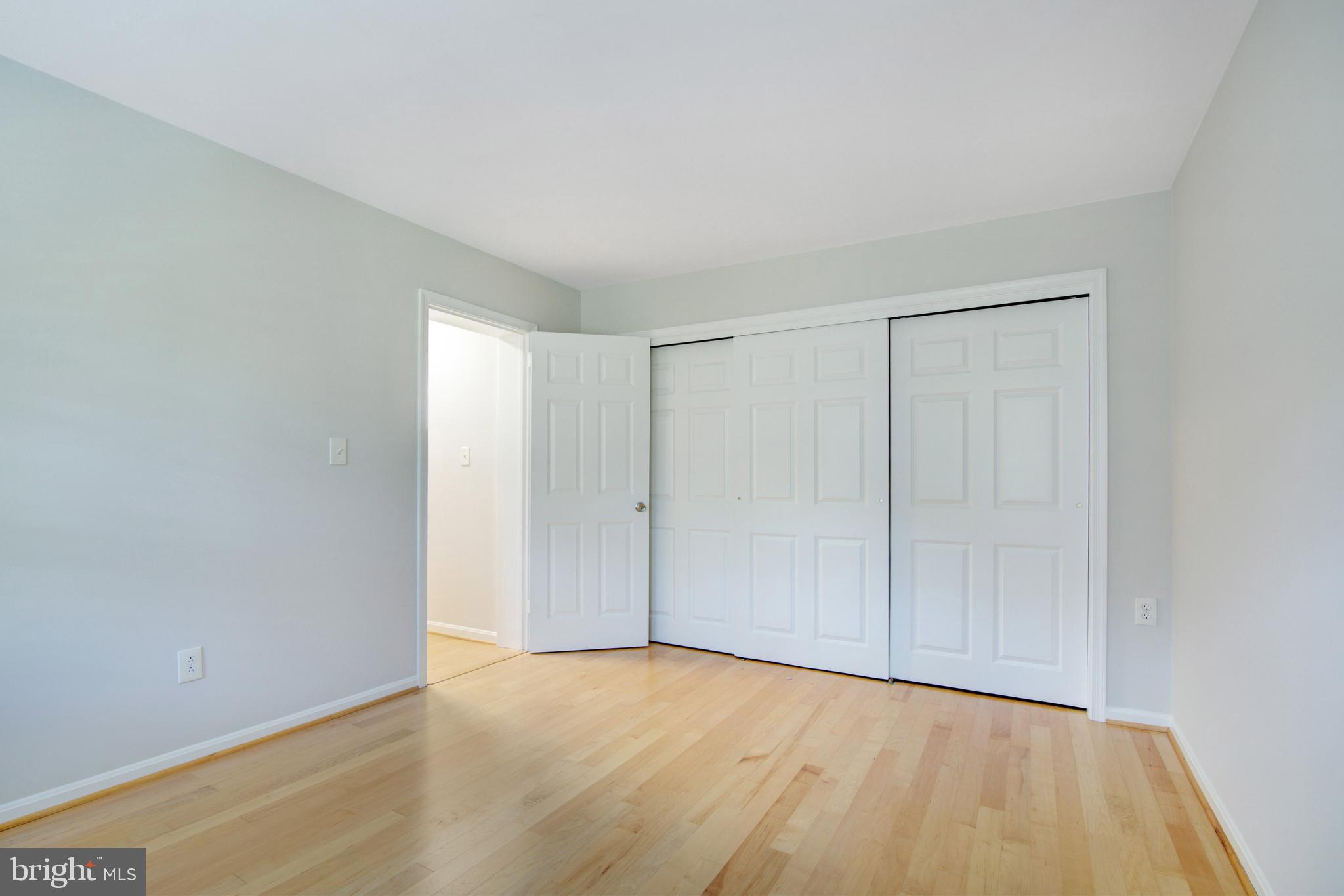 2128 Golf Course Drive Reston, VA 20191 - Photo 52 of 105 Double door closets and maple floors