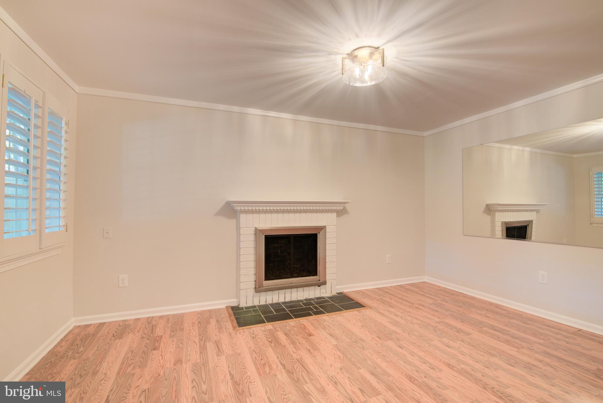 2128 Golf Course Drive Reston, VA 20191 - Photo 63 of 105 Bedroom with wood fireplace