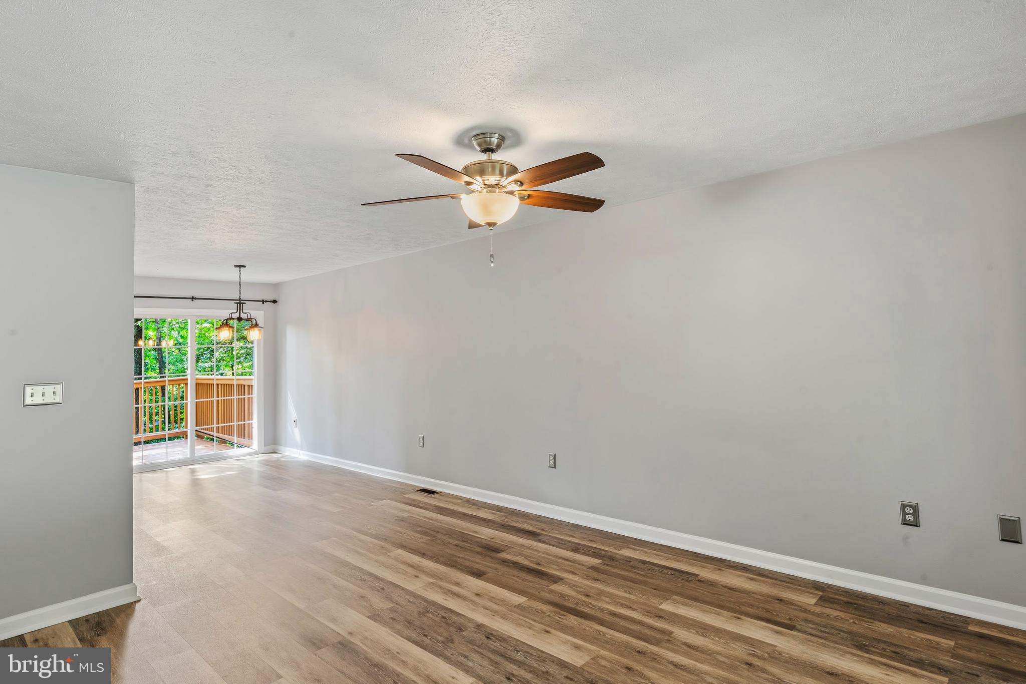 997 Wilderness Road Linden, VA 22642 - Photo 14 of 61 Living room with ceiling fan