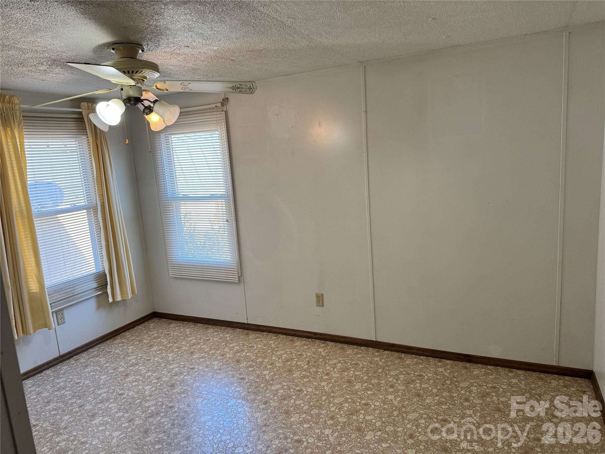 2448 Christopher Road Morganton, NC 28655 - Photo 14 of 32 a view of an empty room with a window