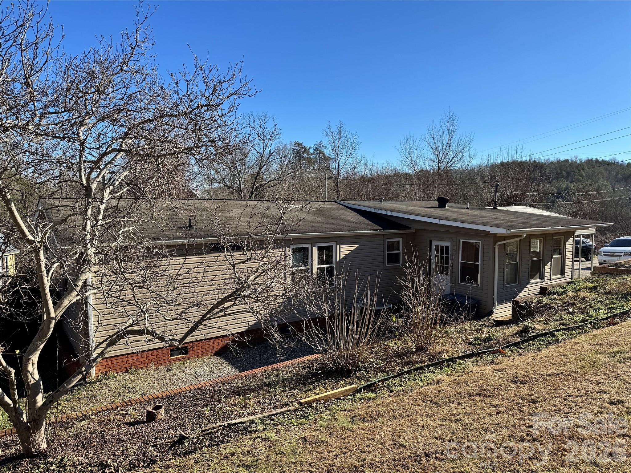 2448 Christopher Road Morganton, NC 28655 - Photo 17 of 32 a view of a house with a patio