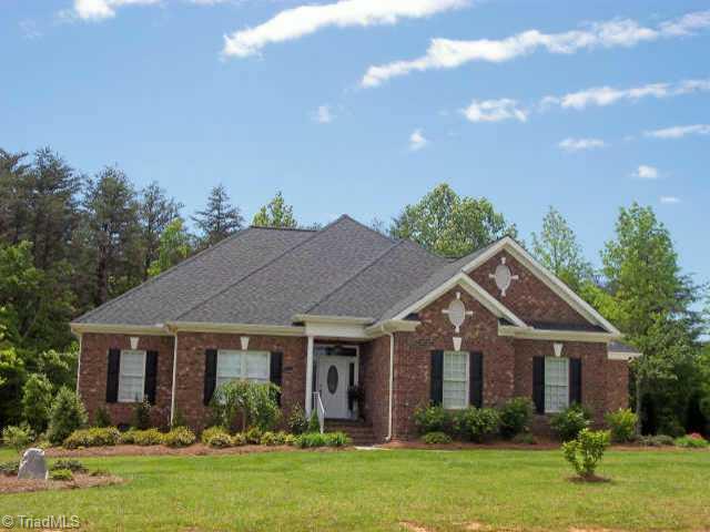 8211 Kelly Ford Road Oak Ridge, NC 27310 - Photo 1 of 9 Exterior Front.