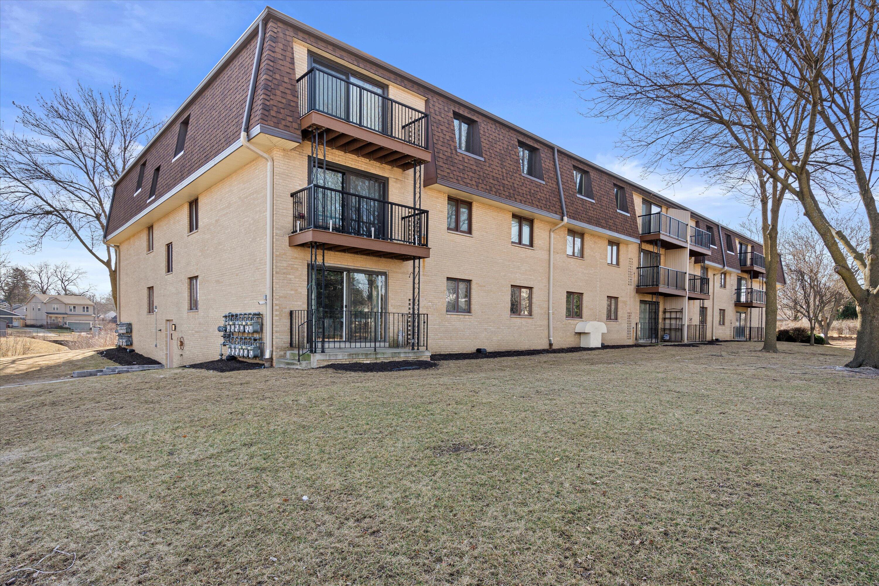 3239 South 58th Street, Unit 310 Milwaukee, WI 53219 - Photo 22 of 24 Back Exterior