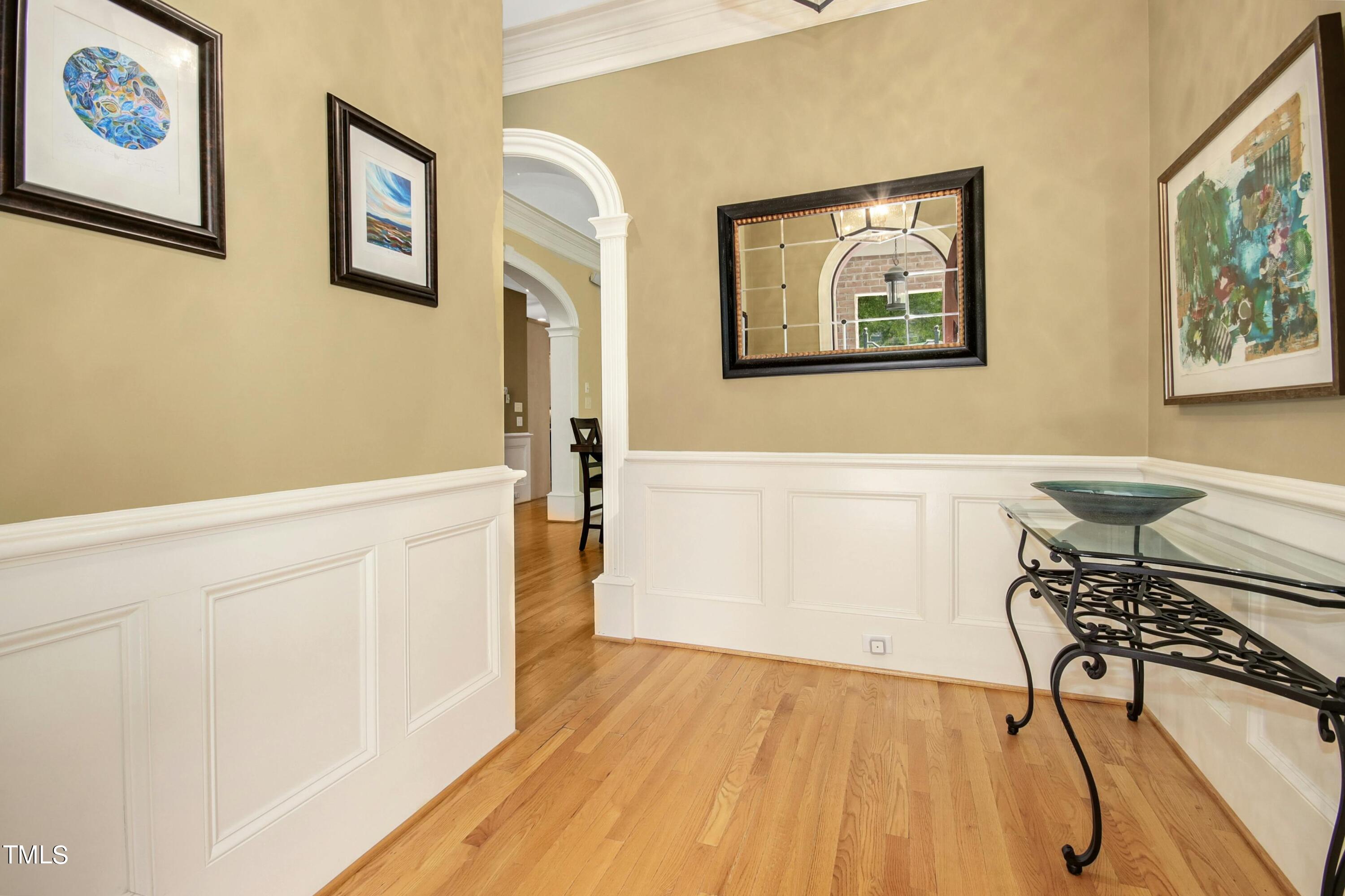 212 West Barbee Chapel Road Chapel Hill, NC 27517 - Photo 15 of 75 a view of a workspace with wooden floor and furniture