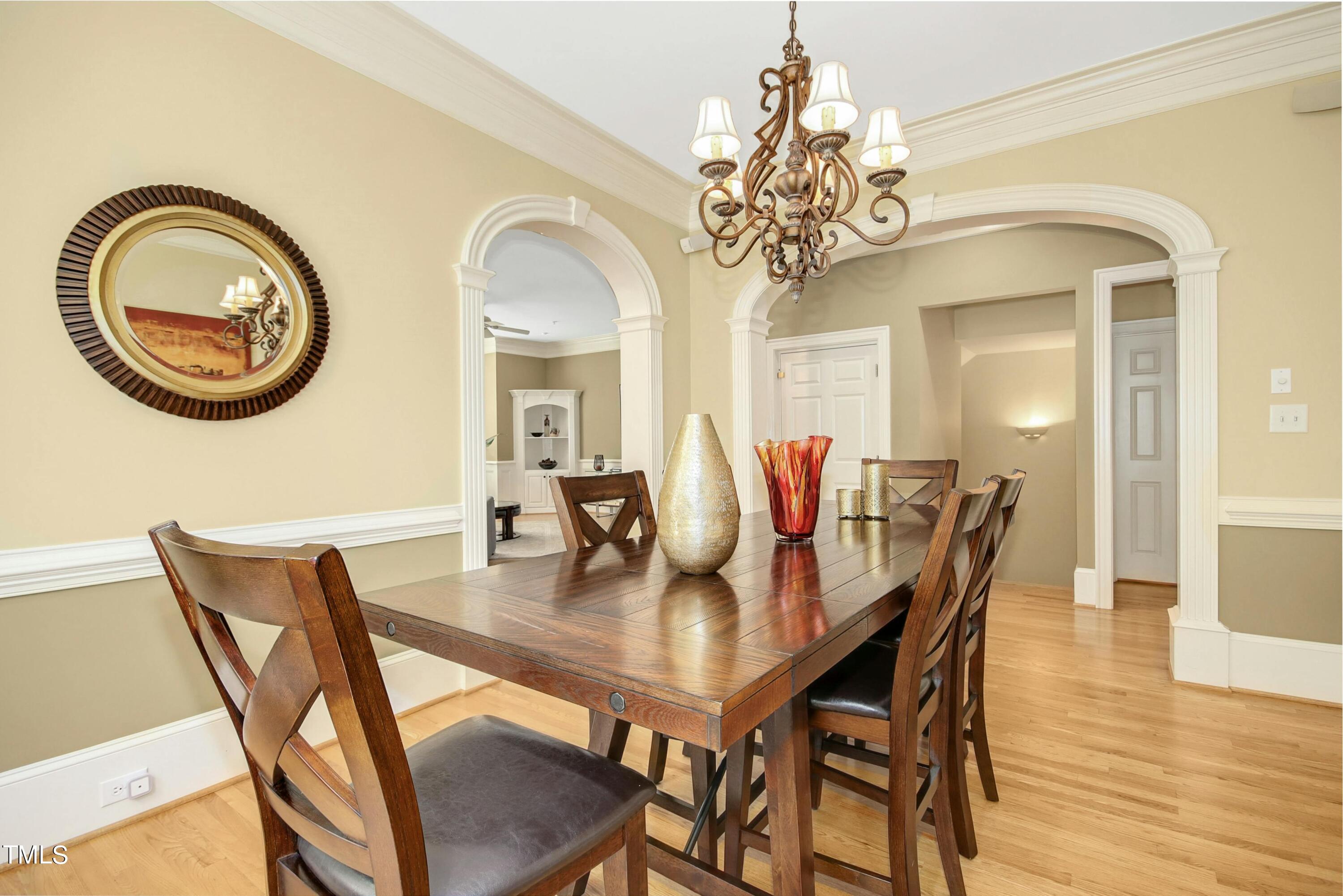 212 West Barbee Chapel Road Chapel Hill, NC 27517 - Photo 20 of 75 a view of a dining room with furniture and wooden floor