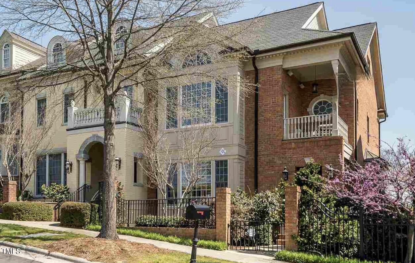 212 West Barbee Chapel Road Chapel Hill, NC 27517 - Photo 2 of 75 front view of a brick house with a tree