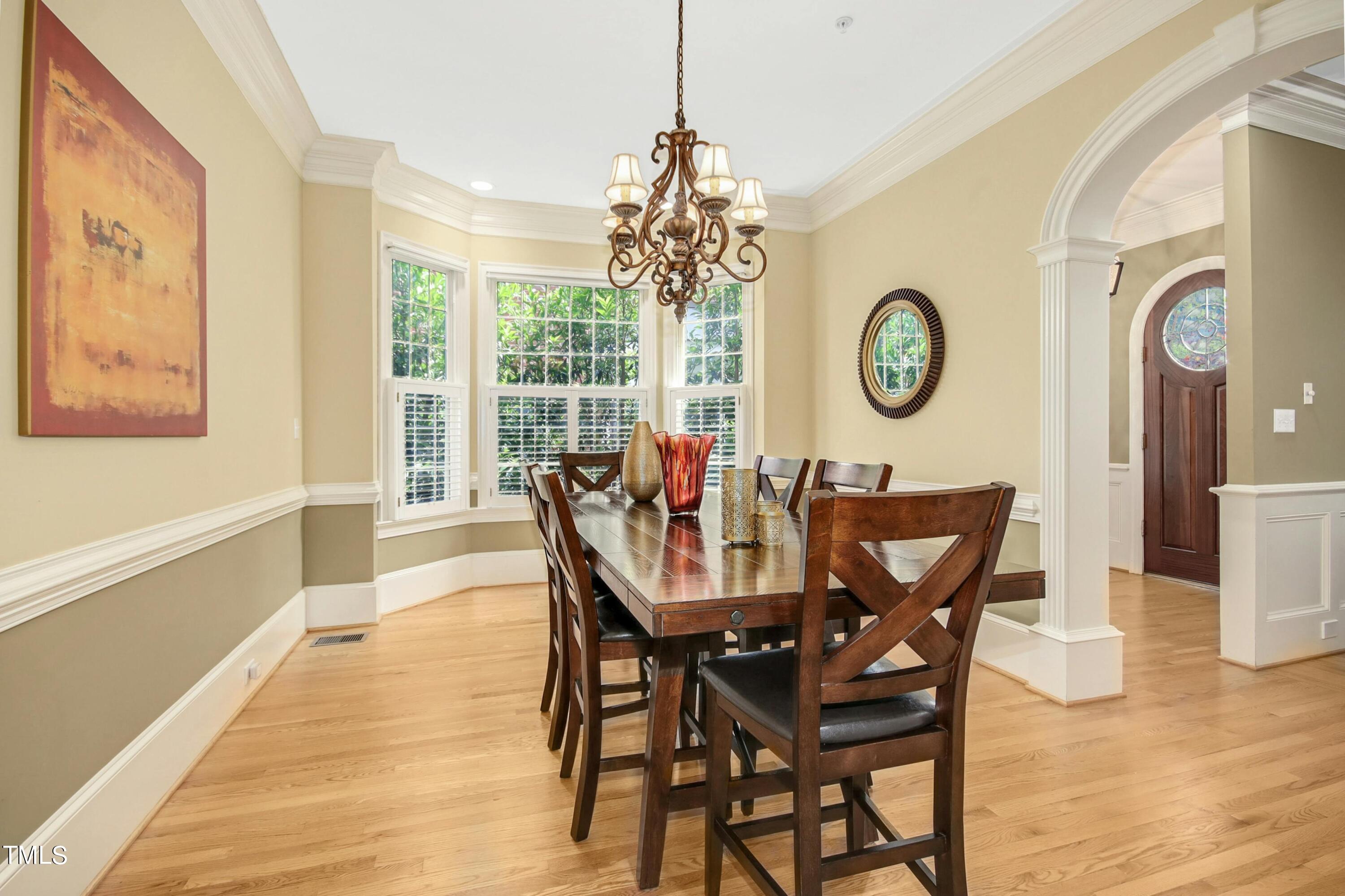 212 West Barbee Chapel Road Chapel Hill, NC 27517 - Photo 21 of 75 a view of a dining room with furniture and a large window
