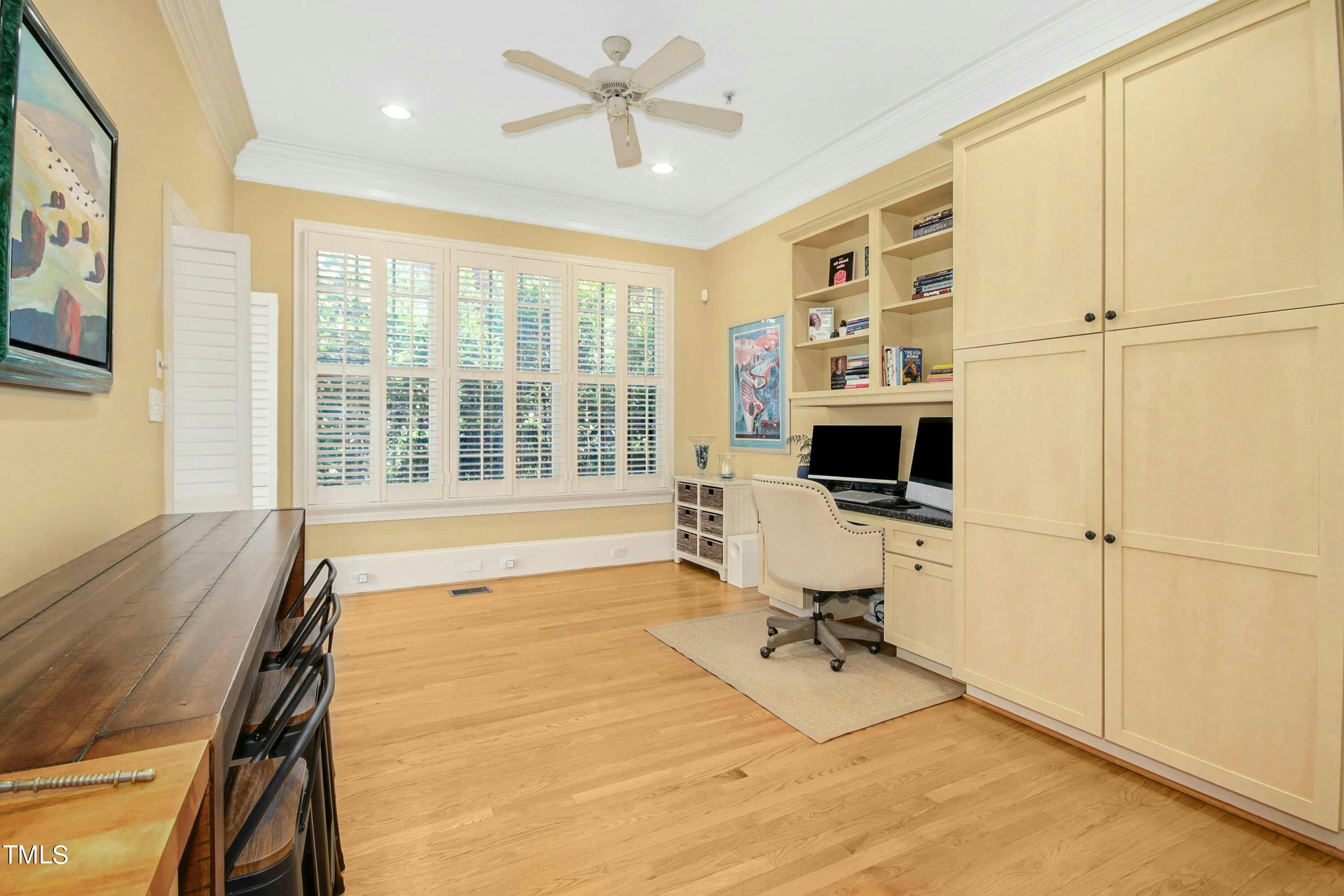 212 West Barbee Chapel Road Chapel Hill, NC 27517 - Photo 29 of 75 a view of a livingroom with workspace and a window