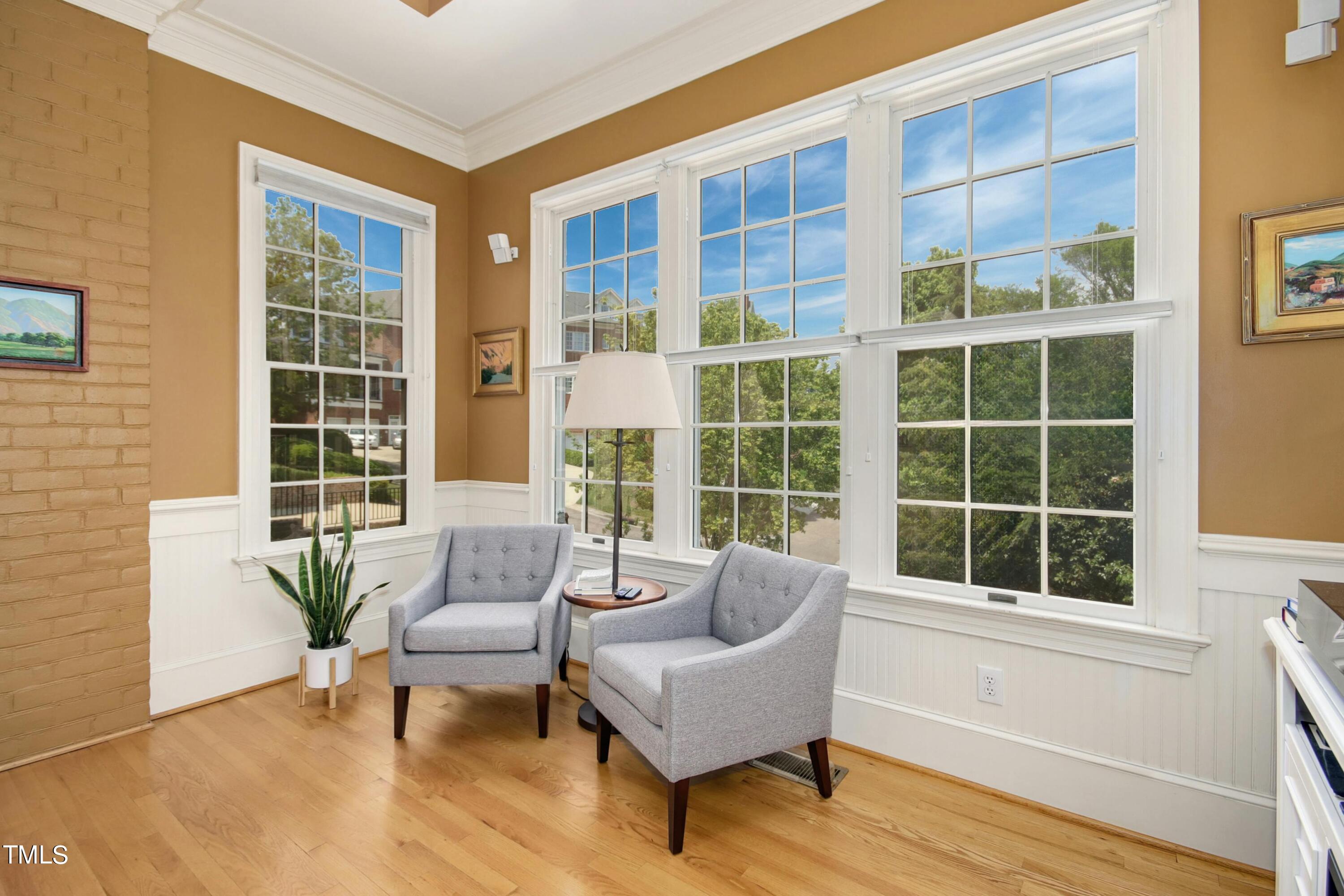 212 West Barbee Chapel Road Chapel Hill, NC 27517 - Photo 30 of 75 a living room with furniture and windows