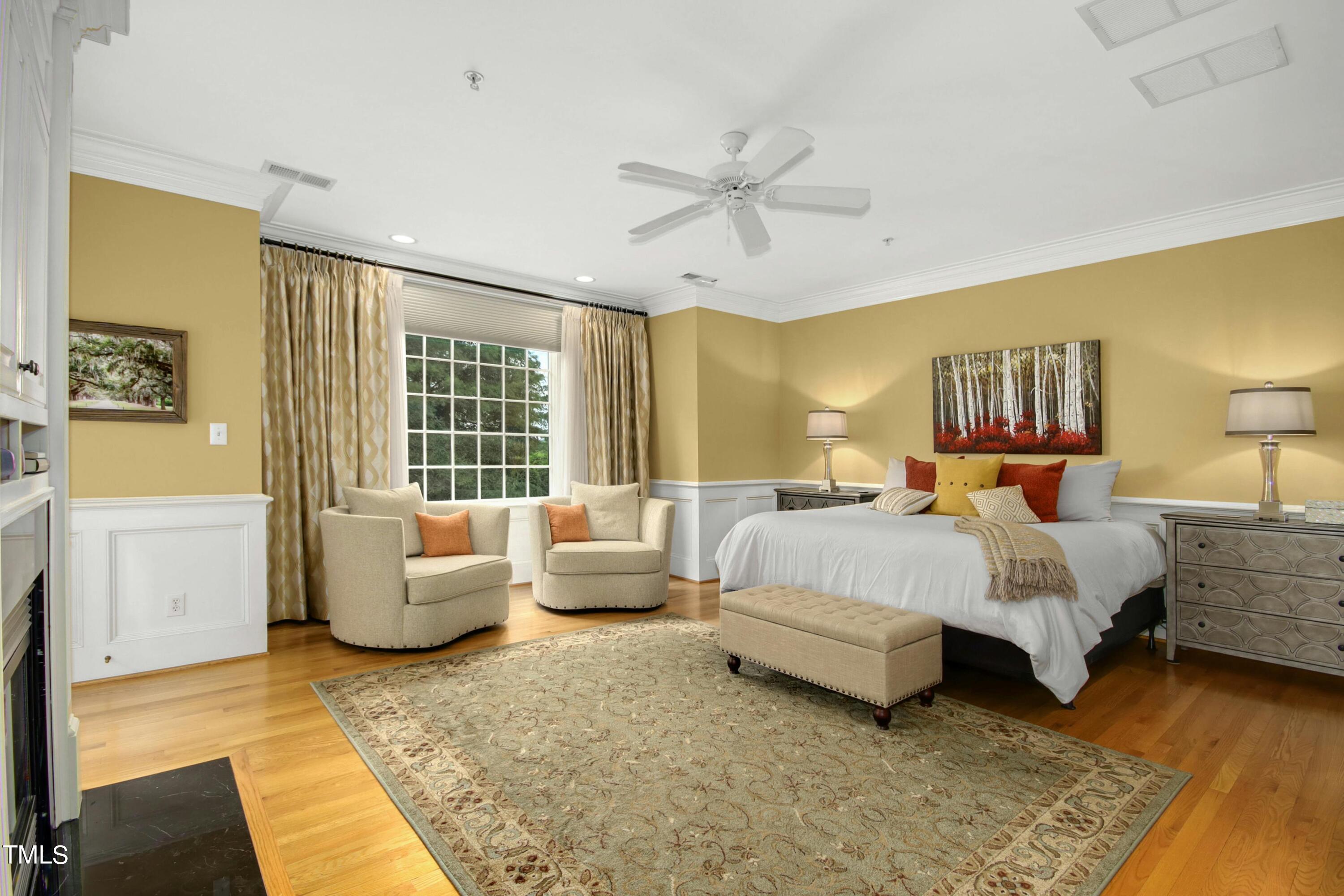 212 West Barbee Chapel Road Chapel Hill, NC 27517 - Photo 37 of 75 a bed room with a bed and a couch