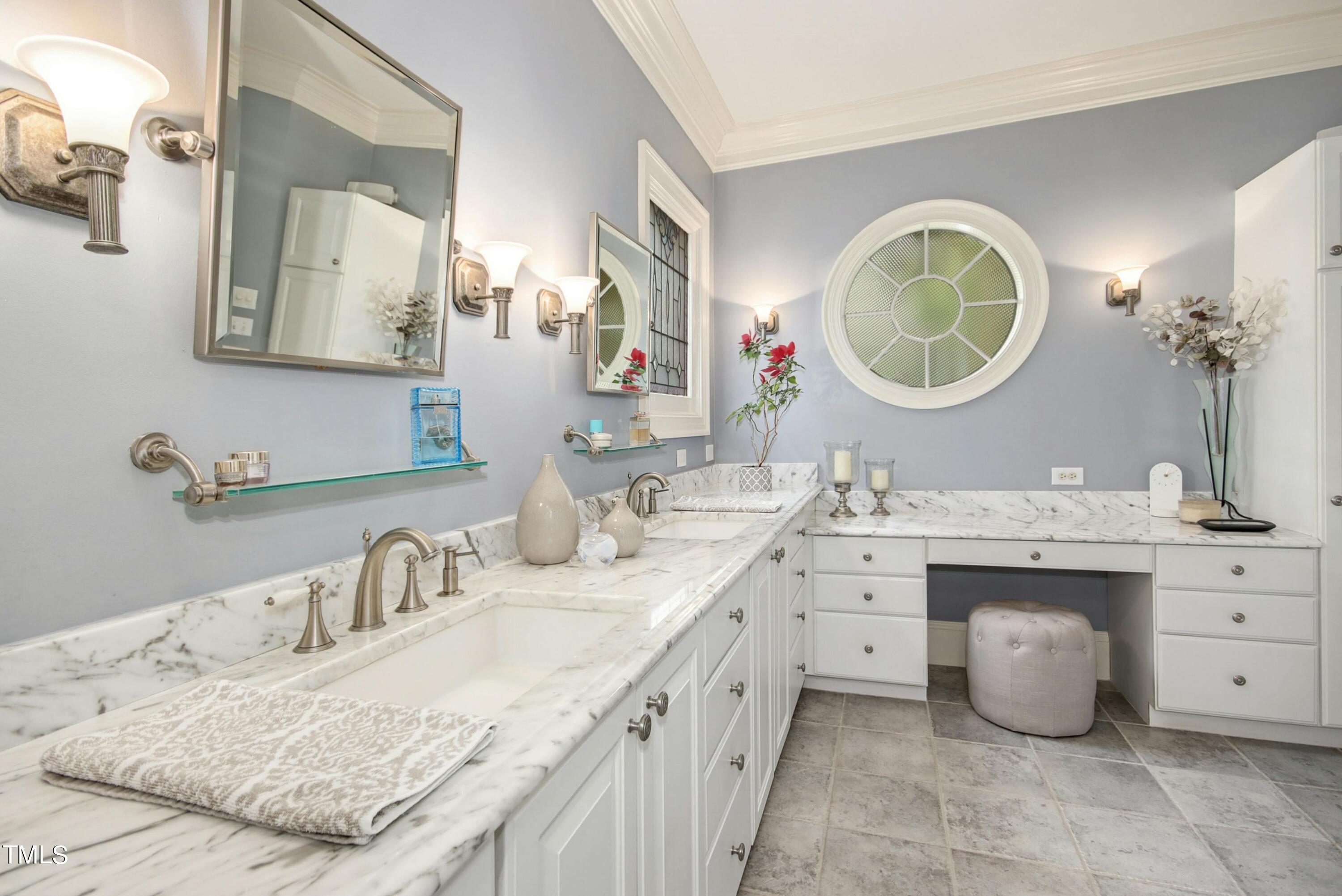 212 West Barbee Chapel Road Chapel Hill, NC 27517 - Photo 42 of 75 a bathroom with a granite countertop sink and a mirror