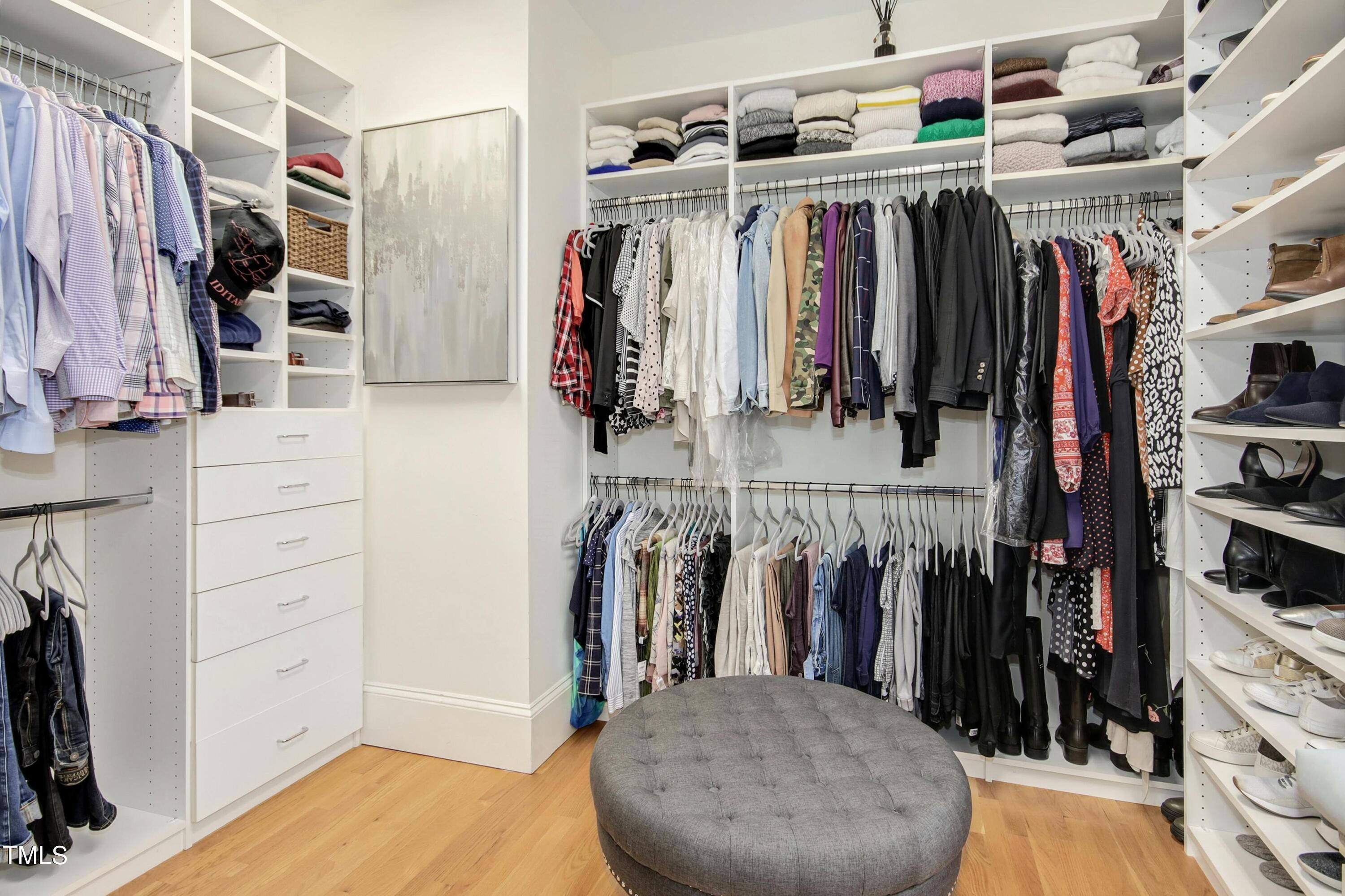 212 West Barbee Chapel Road Chapel Hill, NC 27517 - Photo 44 of 75 a view of walk in closet with clothes and shoes