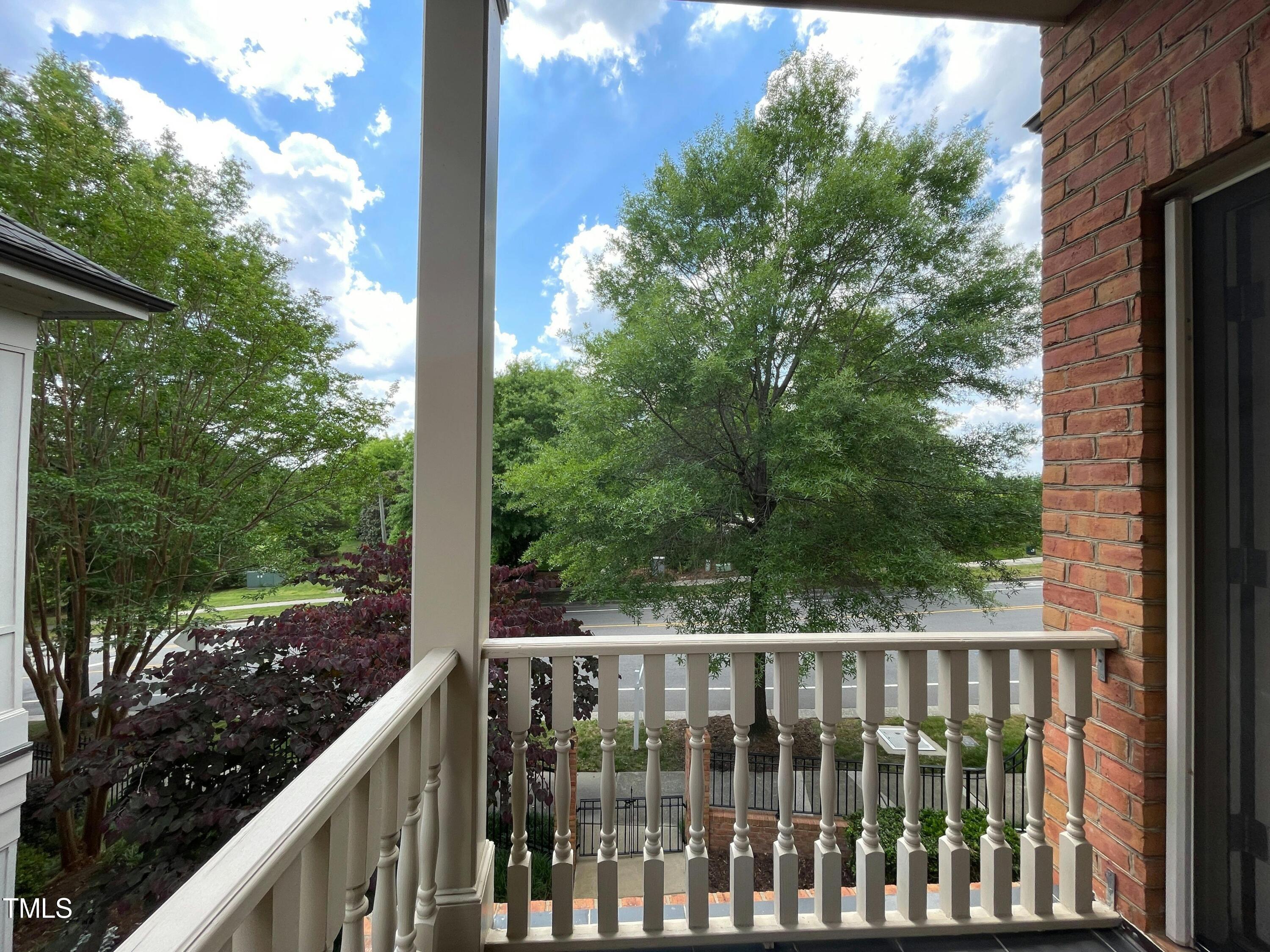 212 West Barbee Chapel Road Chapel Hill, NC 27517 - Photo 47 of 75 a view of a balcony with wooden fence and floor