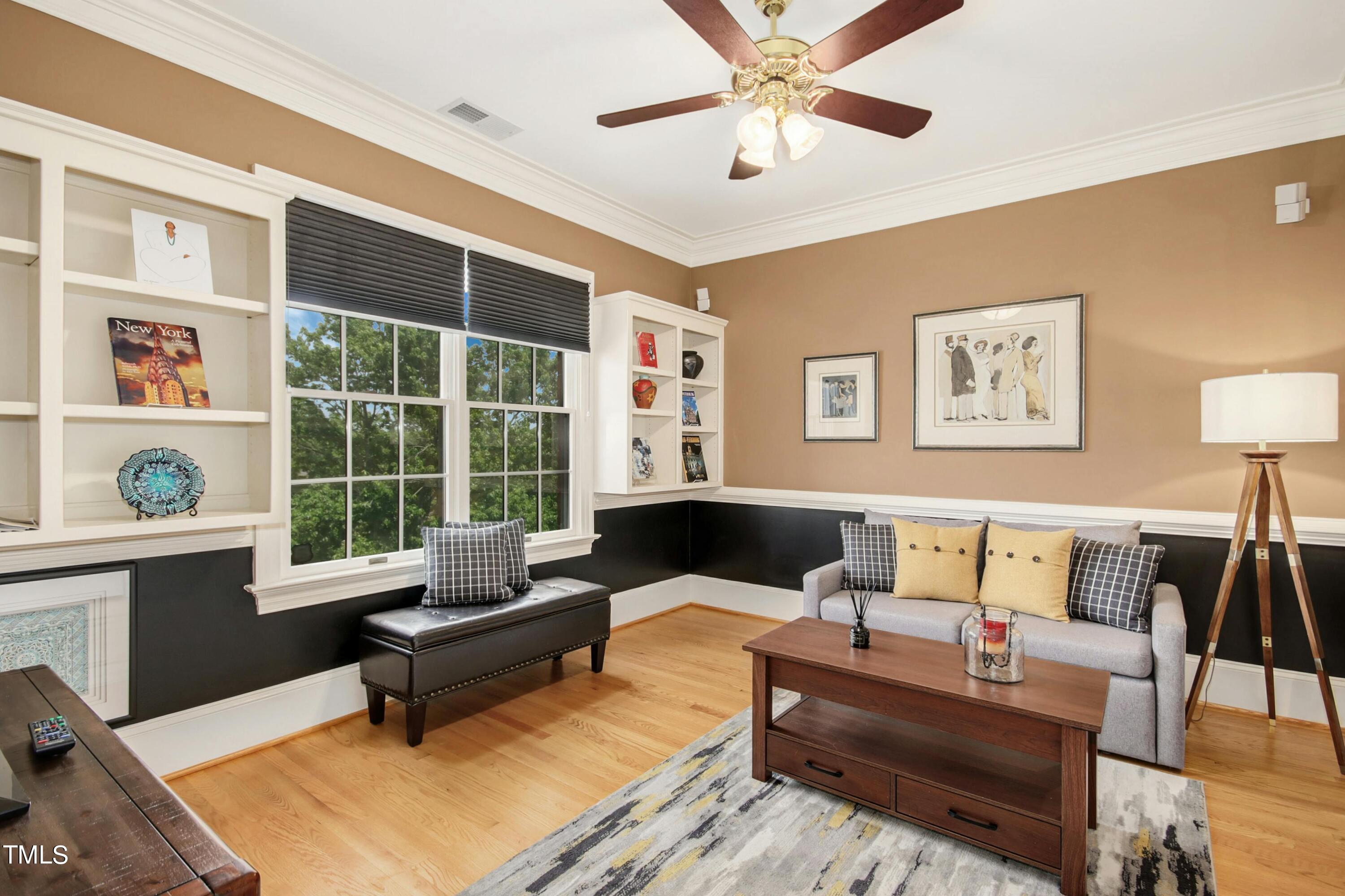 212 West Barbee Chapel Road Chapel Hill, NC 27517 - Photo 51 of 75 a living room with furniture and a table