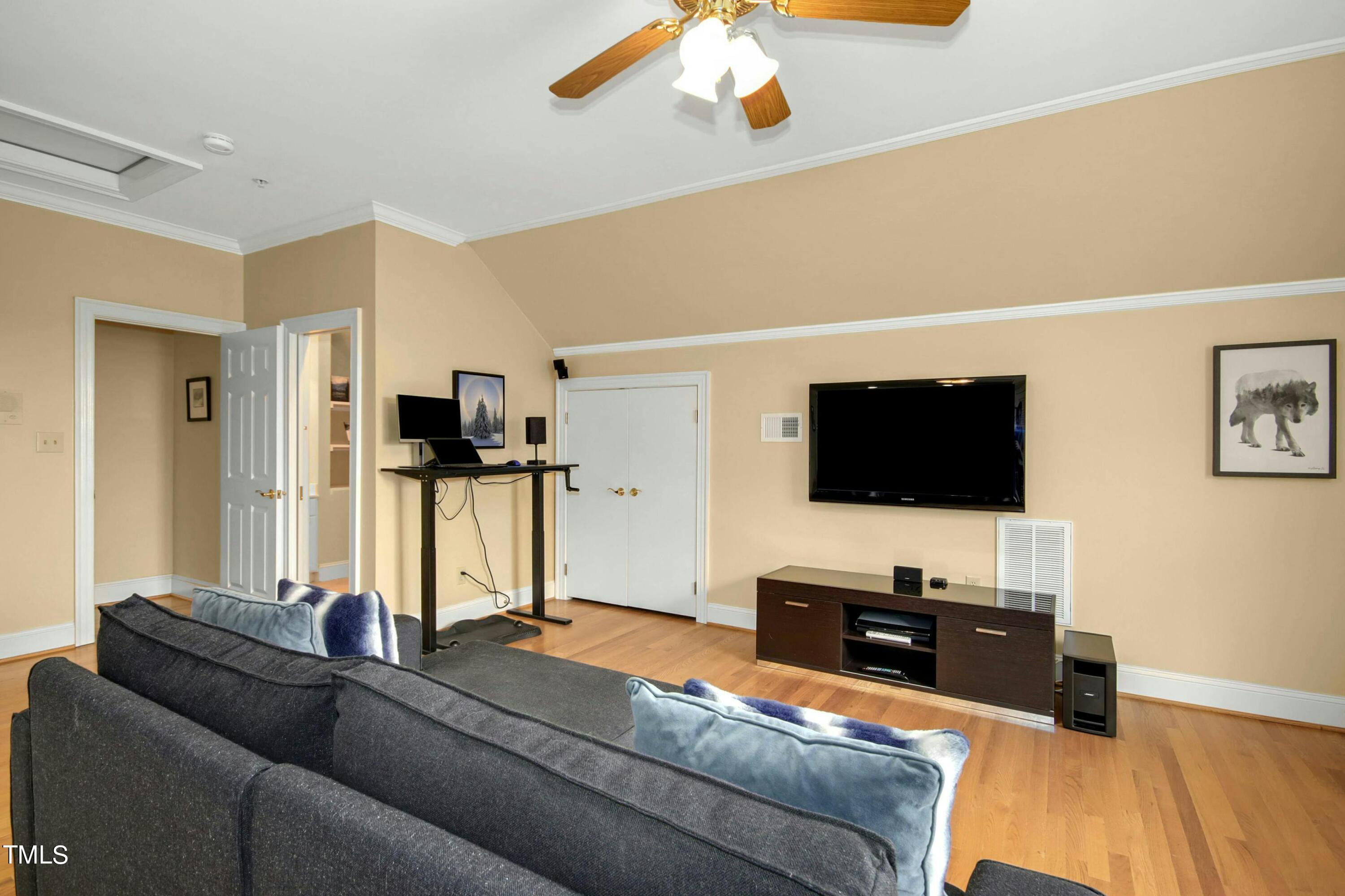 212 West Barbee Chapel Road Chapel Hill, NC 27517 - Photo 53 of 75 a living room with furniture and a flat screen tv