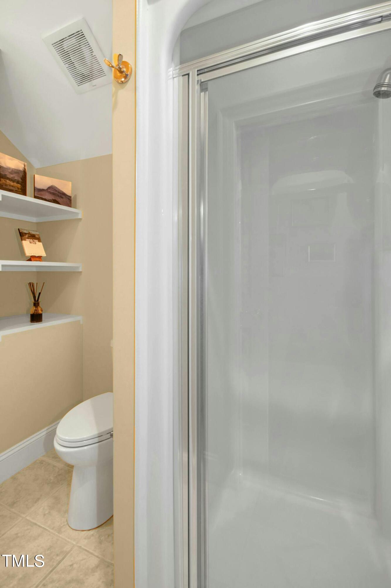 212 West Barbee Chapel Road Chapel Hill, NC 27517 - Photo 57 of 75 a bathroom with a toilet and a shower