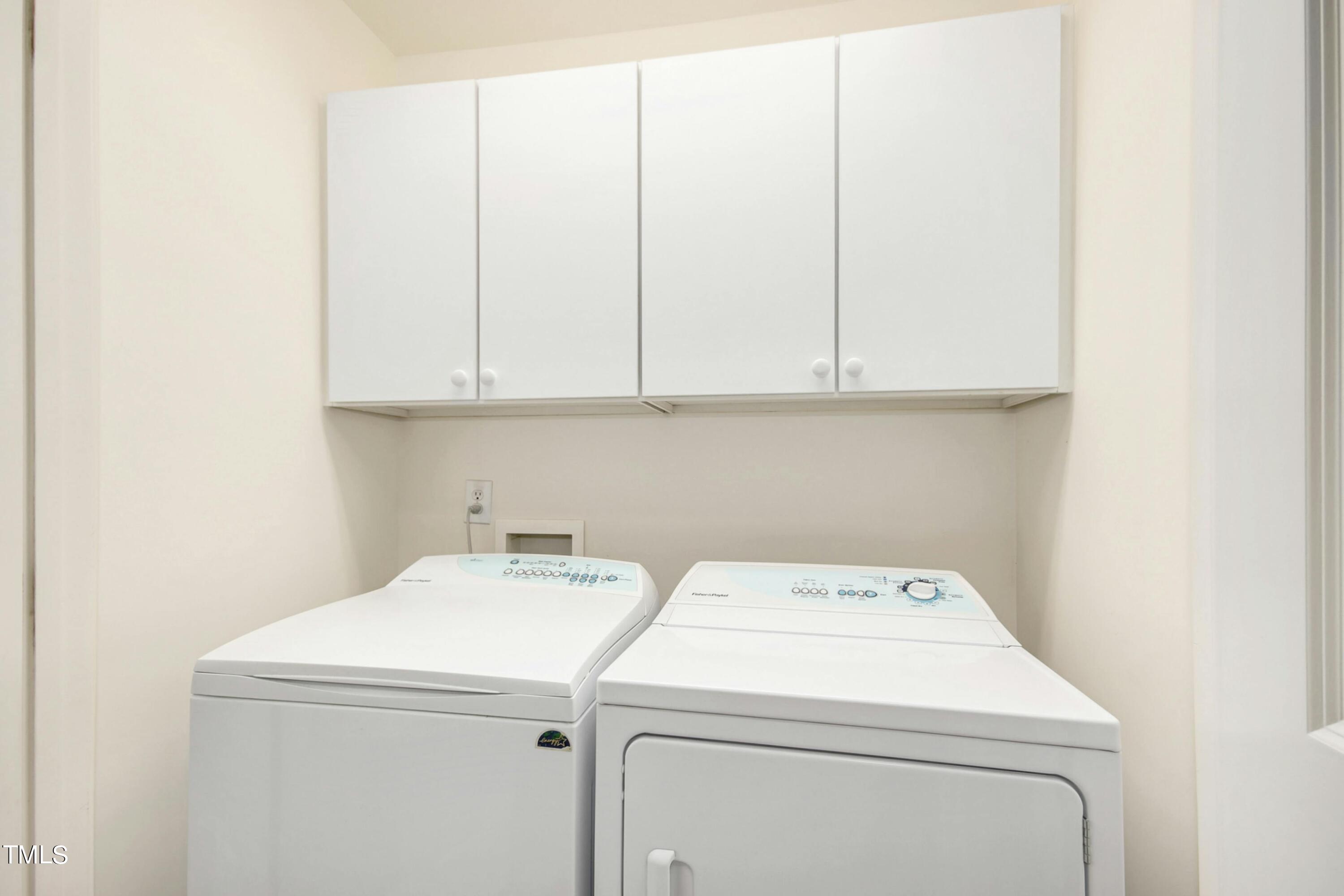 212 West Barbee Chapel Road Chapel Hill, NC 27517 - Photo 60 of 75 a utility room with dryer and washer
