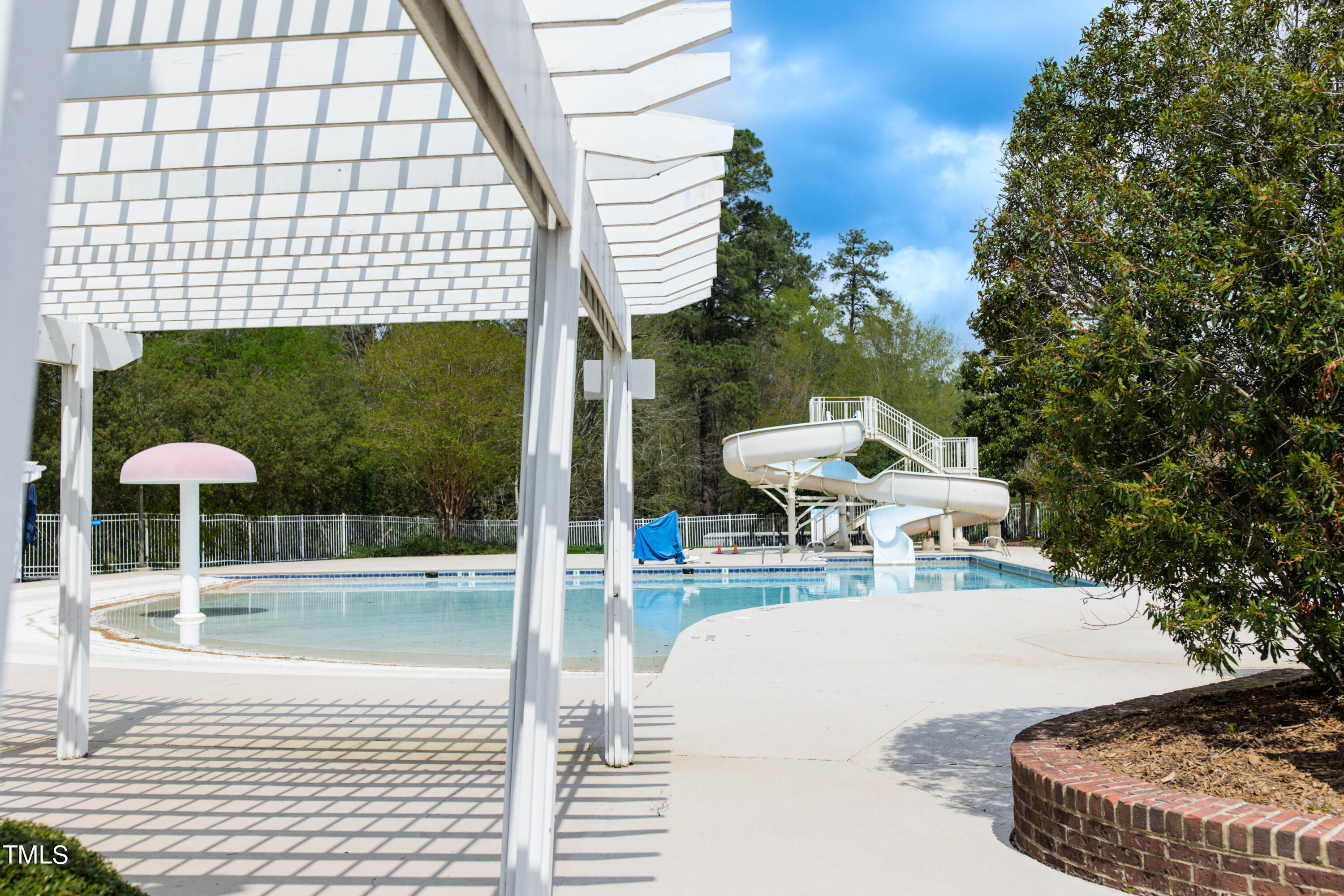 212 West Barbee Chapel Road Chapel Hill, NC 27517 - Photo 72 of 75 a view of a swimming pool with a patio