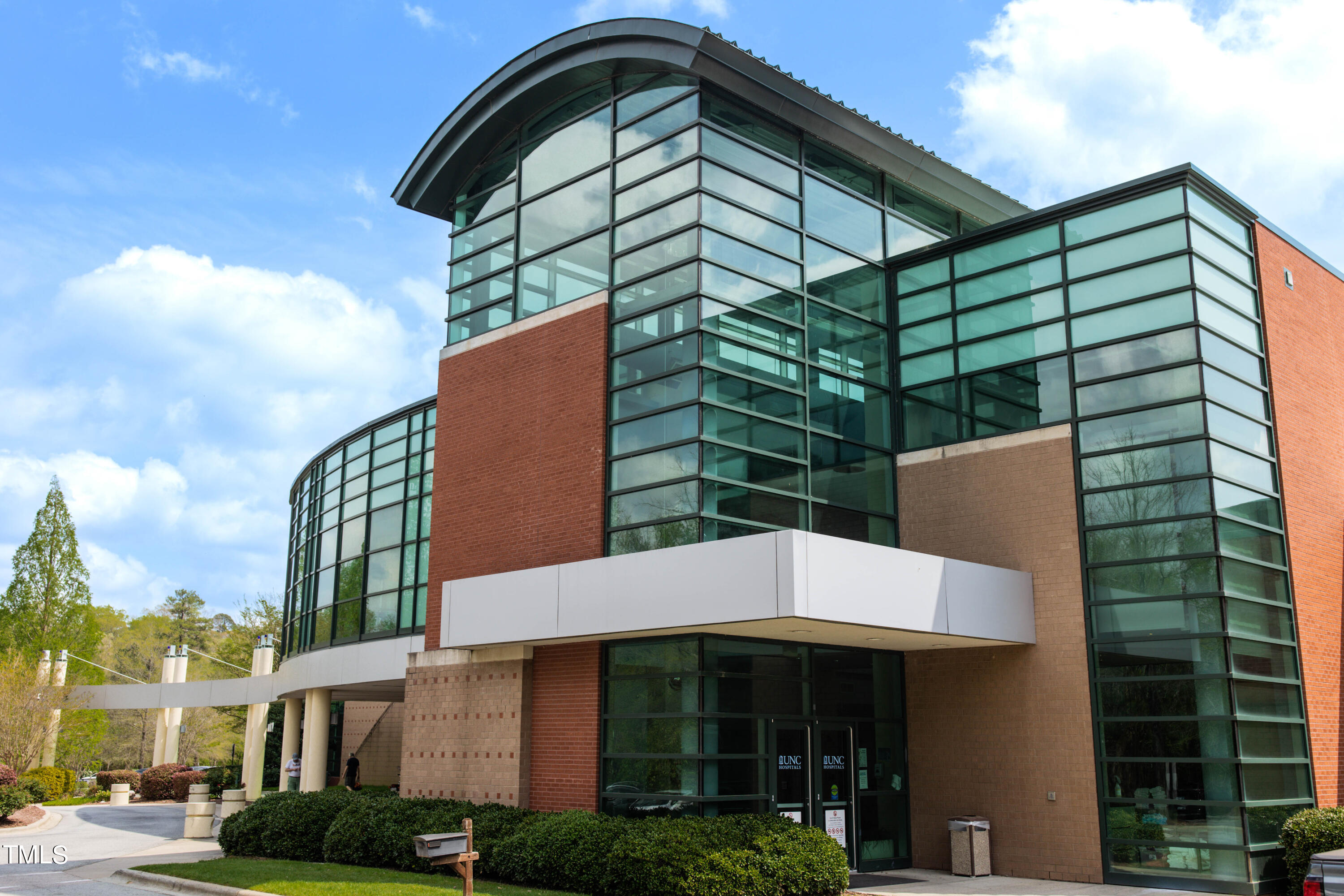 212 West Barbee Chapel Road Chapel Hill, NC 27517 - Photo 73 of 75 a front view of a house with a yard