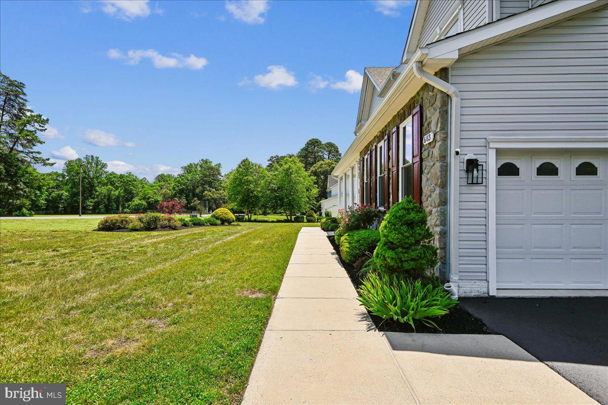 603 Queenstown Road Severn, MD 21144 - Photo 5 of 85 Charming pathway to serene greenery.