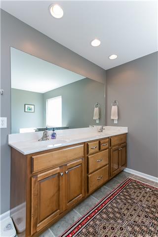 817 Oslo Road Mount Juliet, TN 37122 - Photo 9 of 17 a room with a sink and a mirror